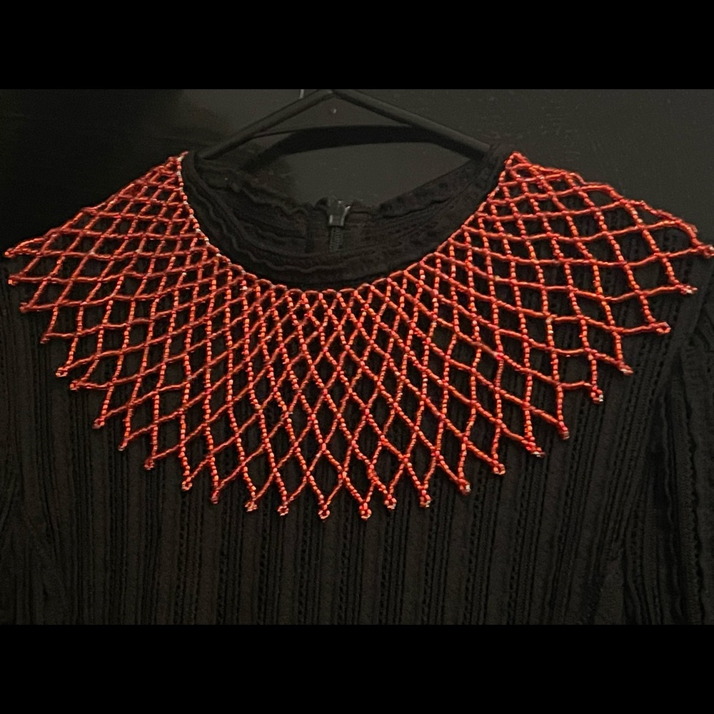 A striking House of Malawi red choker.